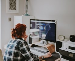 Woman in front of a screen