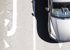 A car on the road viewed from above