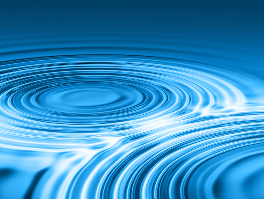 Waves in concentric circles in blue liquid